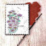 Handmade card with Lisa Arana's cluster of daisy wildflowers and a distressed heart strip, sentiment 'Even if life seems ugly, you are beautiful'.