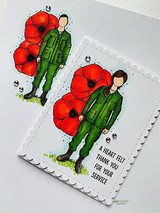Card with a young woman in a green military uniform standing among large red poppies and 'A heart felt thank you for your service.'