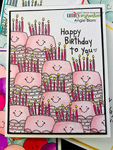 Pile of smiley cakes and balloons in pink, 'Happy Birthday to you.'