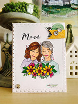 White scalloped card with the pair colored in lavender and grey behind a yellow and pink bouquet, with Mom in script at the top.
