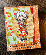 Card with the granny in a red floral dress on tree paper and the "Grandma got run over by a reindeer" sentiment