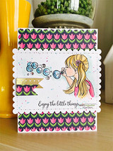 Handmade card with Tierra Jackson's sweet young girl blowing a trailing stream of bubbles, script sentiment 'Enjoy the little things...'.
