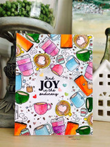 Card of the colored mug border around "JOY" with a striped panel.