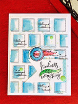 Card with a grid of blue postmark squares and 'kindness changes everything.'