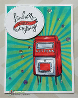 Card with a red mailbox marked 'lettere' on a teal sunburst, 'kindness changes everything.'