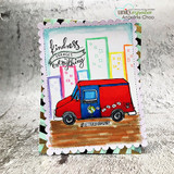 Card with a red mail truck driving past colorful buildings, 'kindness changes everything.'