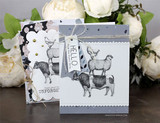 Two floral-trimmed cards with the animal stack and 'HELLO' tags.
