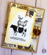 Vintage collage card with the stack over newsprint and mince-pie ephemera.