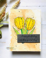 Soft card with a hand-colored yellow tulip, stamped 'happy birthday - on this special day.'