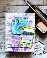 Purple splatter card with the instant camera and a Polaroid photo, stamped 'Remember, you can always take another shot.'