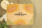 Soft neutral card with two pale sunflowers and the 'every day feels like summer' sentiment.