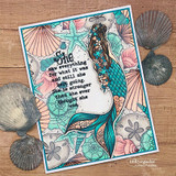 Shell border around a colored mermaid with a teal tail on a wood background, 'She' sentiment.