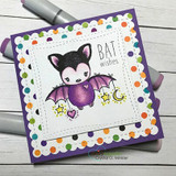 Bat on a polka-dot framed card with purple base, 'BAT wishes'.