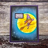 Purple framed card with a blue and gold moon, the little witch on her broom colored in purple and green, and "trick or treat!" on a black label.