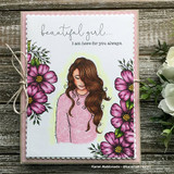 Rustic card with the girl in a coral top framed by purple stamped flowers and 'beautiful girl' at the top.