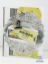 Sample card: the 'happy BiRtHdAy to you friend' sentiment clipped to a silver doily over yellow floral and black stripes