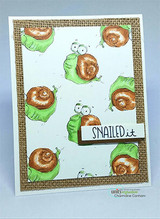 Card with rows of colorful snails framed in a gold border, 'SNAILED it.'