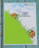 Simple card with a snail and 'SORRY I'm a little late' by a plant.
