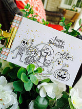 Skeleton, mummy and ghost group, 'happy Halloween,' on white with greenery.