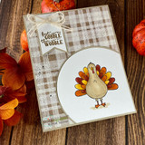 Card using the paper pack: a colorful turkey with 'gobble till you wobble' on plaid.