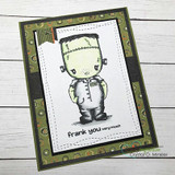Card on olive and dotted papers with Frank colored green with a grey jumpsuit, over 'frank you very much.'
