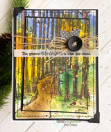 Layered card of the woods in autumn golds with 'The greatest adventure is what lies ahead.'