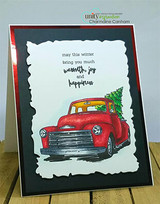 Dramatic black-bordered card of a red truck with "may this winter bring you much warmth joy and happiness."