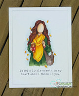 White-bordered card of the girl in a yellow sweater and green scarf with the little-warmth sentiment