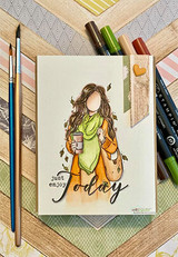 Autumn craft scene with the girl colored in orange and green tones beside 'just enjoy Today'