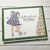 Green-framed card with the girl in a lilac dress and string lights beside a stitched Christmas tree, finished with a sparkle sentiment from another set.