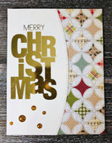 Card with gold 'MERRY CHRISTMAS' block letters over a geometric medallion pattern.