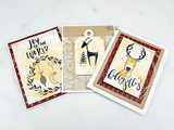 A set of tags with sketchy deer, wreaths and 'Joy to the World' / 'holly jolly'.