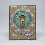 Kraft card with a deer in a wreath and 'Winter wishes'.