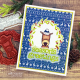 Card with a deer in a wreath on a blue winter panel and 'season's greetings'.