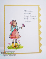 Card with the girl in a pink cape and coral dress with yellow boots holding a pink bird on white, the Emerson sentiment above and a gold zigzag border.