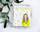 Soft card with the girl holding a cross over a leafy doily and the my-heart-trusts scripture.