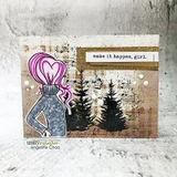 Distressed brown card with the pink-haired heart-bun girl beside stamped pine trees and 'make it happen, girl.' on a gold panel.