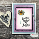 Purple and pink framed card with a yellow daisy stem and the sentiment 'Don't be afraid just Believe'
