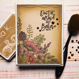 Kraft card with the wildflower corner stamped in the lower left, colored blooms, and 'Don't be afraid just Believe' from Mark 5:36