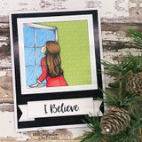 Framed card with the girl at a green-curtained window, 'I Believe.'