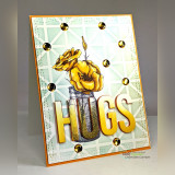 Sample card in soft mint and orange with a stenciled geometric background, a stamped mason jar of golden poppies, scattered gold gem accents and gold die-cut letters spelling HUGS.