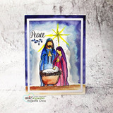 Watercolor Peace card of the nativity in purple and blue under a bright gold star.