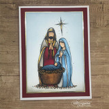 Wood-paneled nativity card colored in deep reds and blues with a starlit sky.