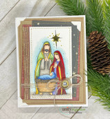 Plaid and starry paneled nativity card with a twine-wrapped gold medallion.