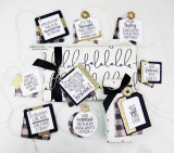 Collection of gift tags in black, gold and plaid stamped with the funny sentiments.