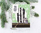 Card with birch trunks on a green snowflake panel and a small owl perched on a branch; the sentiment shown is from another set.