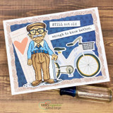 Card with the dapper old man beside a bicycle on blue star paper with 'STILL not old enough to know better.'