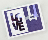 Purple foiled LOVE card with 'you' flag banner