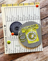 Card with a yellow rotary phone over a vintage telephone-index page, 'not old, just vintage.'
