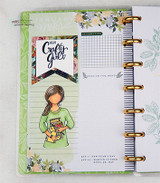 Planner page with the crafty girl in a green top: 'Hello crafty girl.'